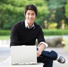 male student at laptop