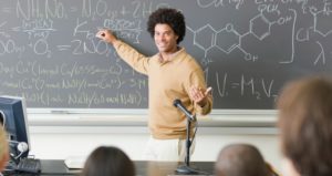 chemistry student at blackboard