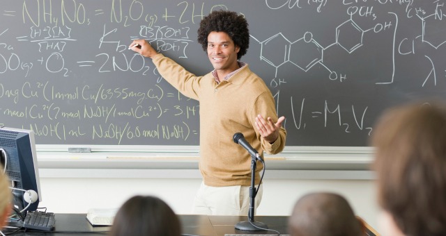 chemistry student at blackboard