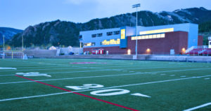 College football field with spotlight reflects parable in article