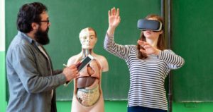Student has virtual reality headset in classroom