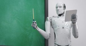 robotic teacher presents information in front of chalkboard