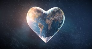 World in heart shape reflecting PEACE in online classes
