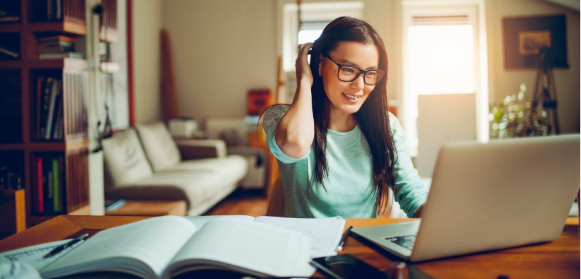 Student watching video for online course