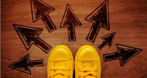 Shoes with arrows in front of them indicate transition