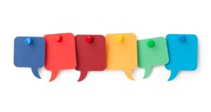 Six colorful sticky notes in the shape of talking blurbs