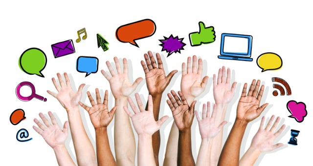 People's hands are raised with online icons displayed on top of their hands