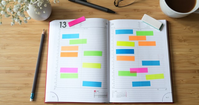 Planner with colorful sticky notes