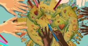 Hands from different ethnicities come together to draw the world